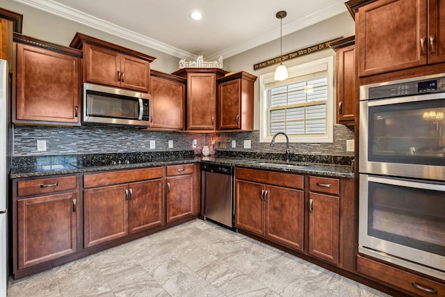 1328 Winterset Dr, Clarksville, TN 37040 - kitchen featuring appliances with stainless steel finishes, a sink, ornamental molding, dark stone counters, and backsplash
