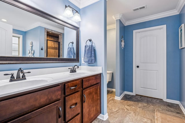 1328 Winterset Dr, Clarksville, TN 37040 - full bathroom featuring crown molding, double vanity, toilet, and baseboards