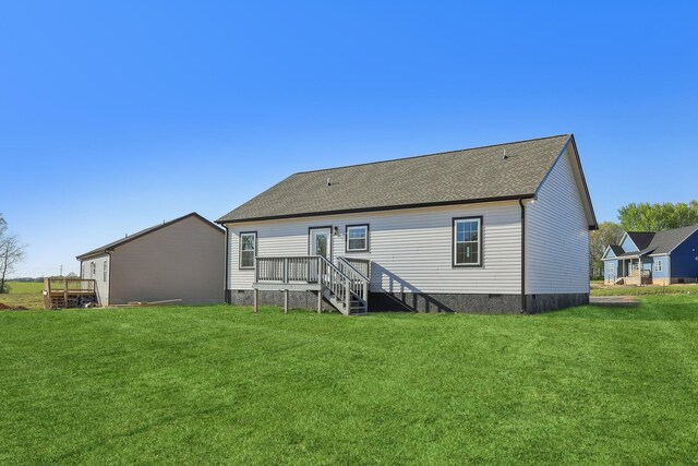 174 Amos Cir, Lafayette, TN 37083 - rear view of property featuring a lawn, a deck, a shingled roof, and crawl space