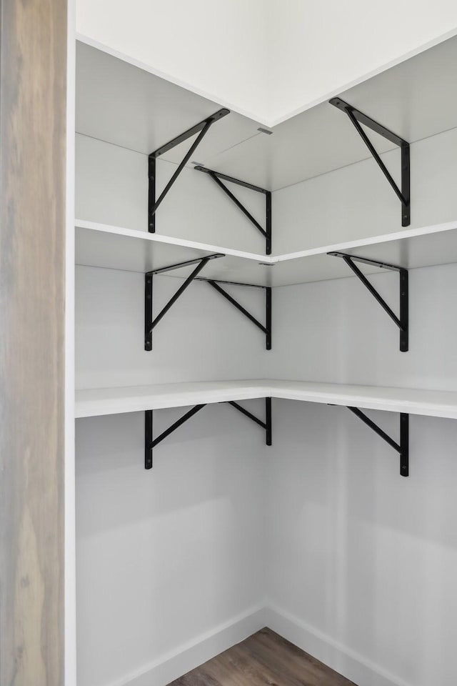 132 Amos Cir, Lafayette, TN 37083 - walk in closet featuring dark wood finished floors