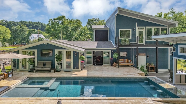 1561 Matlock Dr, Chapmansboro, TN 37035 - rear view of property with a patio and a pool with connected hot tub