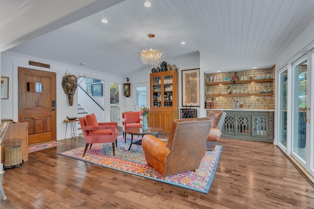 1561 Matlock Dr, Chapmansboro, TN 37035 - living room featuring vaulted ceiling, stairs, wooden ceiling, a chandelier, and wood finished floors