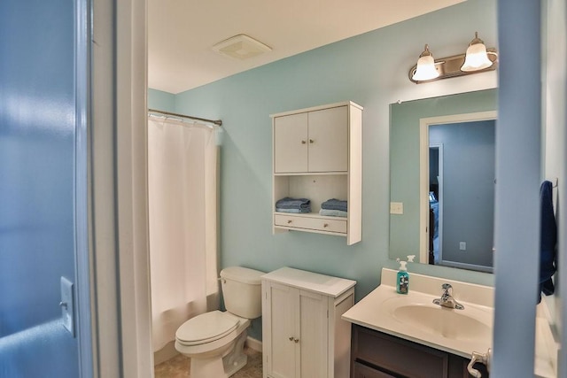 full bath with toilet, vanity, and visible vents