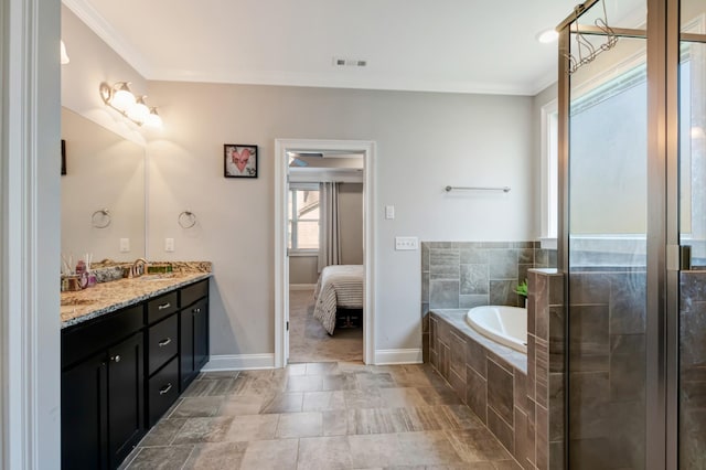 full bathroom featuring a garden tub, ensuite bathroom, vanity, ornamental molding, and baseboards