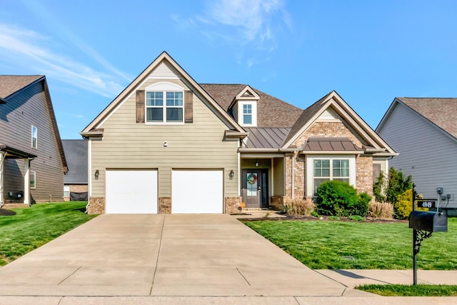 craftsman-style house featuring an attached garage, metal roof, concrete driveway, a front lawn, and a standing seam roof