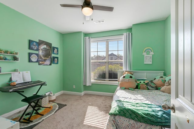 bedroom with visible vents, baseboards, a ceiling fan, and carpet flooring
