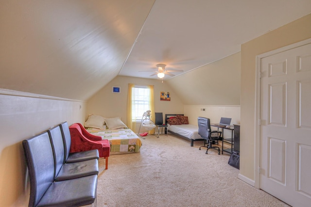 bedroom with carpet flooring, ceiling fan, and lofted ceiling