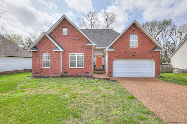 traditional-style house featuring crawl space, an attached garage, a front lawn, and brick siding