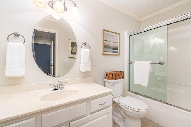 bathroom featuring shower / bath combination with glass door, vanity, ornamental molding, tile patterned flooring, and toilet