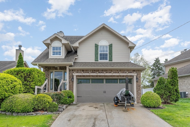 view of front of house featuring central AC, roof with shingles, fence, a garage, and driveway