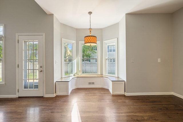 entrance foyer with visible vents, baseboards, and dark wood finished floors