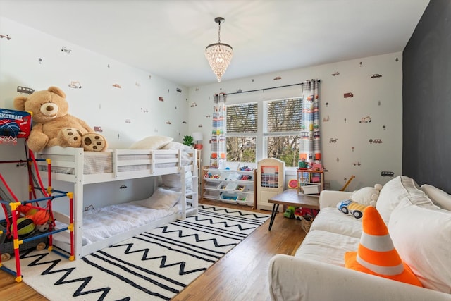 bedroom with wood finished floors