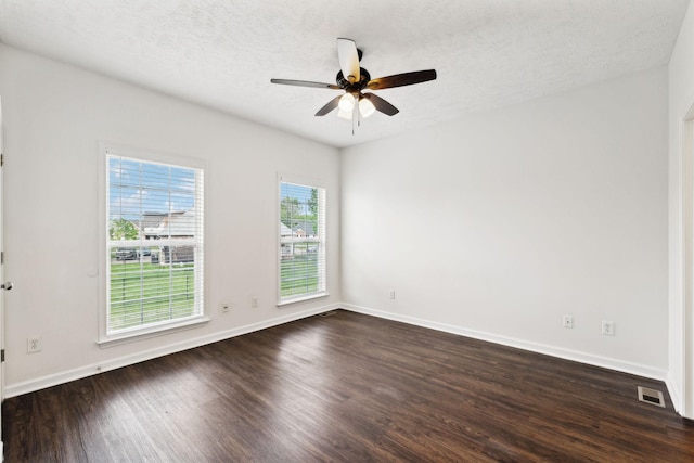 213 Nashua Ct, Murfreesboro, TN 37128 - empty room featuring dark wood-style flooring, a ceiling fan, visible vents, and baseboards