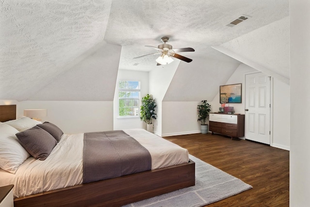 213 Nashua Ct, Murfreesboro, TN 37128 - bedroom featuring wood finished floors, a textured ceiling, lofted ceiling, and visible vents