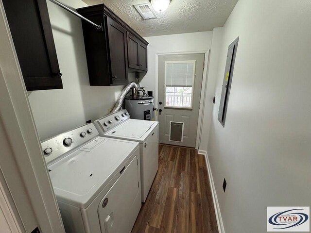 5380 Sulphur Creek Rd, Big Sandy, TN 38221 - washroom featuring water heater, a textured ceiling, independent washer and dryer, cabinet space, and dark wood finished floors