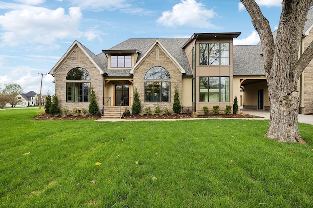 521 Mansion Dr, Brentwood, TN 37027 - view of front facade with roof with shingles, stucco siding, stone siding, and a front lawn