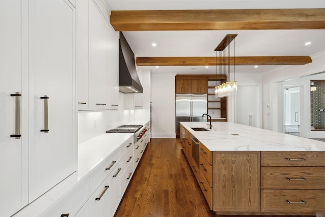 521 Mansion Dr, Brentwood, TN 37027 - kitchen with wall chimney exhaust hood, dark wood-type flooring, stainless steel gas cooktop, a sink, and beam ceiling