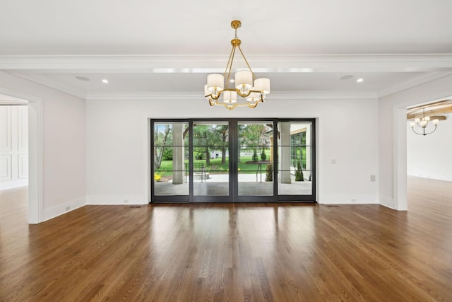 521 Mansion Dr, Brentwood, TN 37027 - spare room with crown molding, baseboards, an inviting chandelier, and wood finished floors