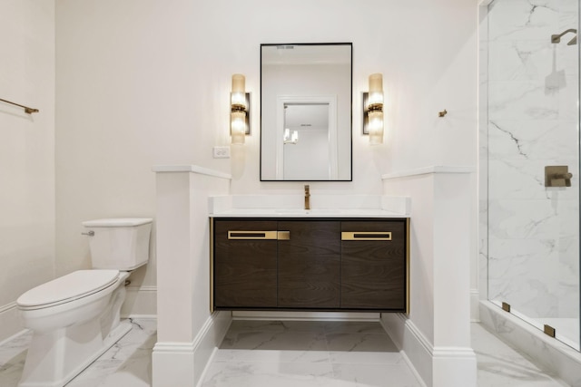 521 Mansion Dr, Brentwood, TN 37027 - bathroom featuring toilet, vanity, marble finish floor, and a marble finish shower
