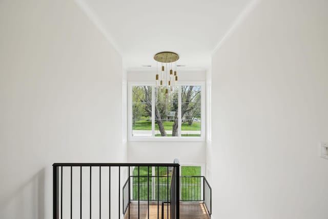 521 Mansion Dr, Brentwood, TN 37027 - stairs with ornamental molding and an inviting chandelier