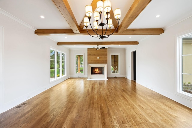 521 Mansion Dr, Brentwood, TN 37027 - unfurnished living room featuring visible vents, beam ceiling, and light wood-style floors