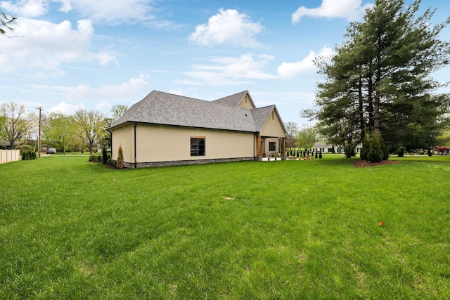 521 Mansion Dr, Brentwood, TN 37027 - exterior space featuring a shingled roof, a lawn, and stucco siding