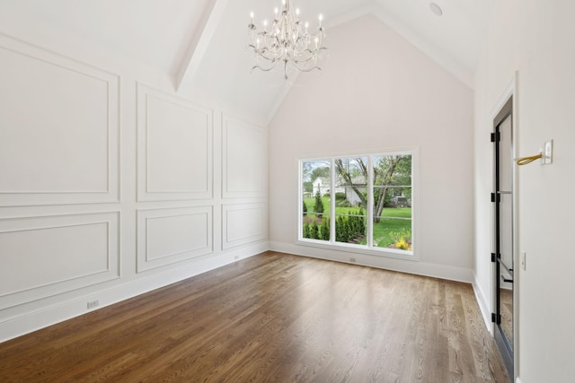521 Mansion Dr, Brentwood, TN 37027 - spare room featuring baseboards, an inviting chandelier, beam ceiling, high vaulted ceiling, and wood finished floors