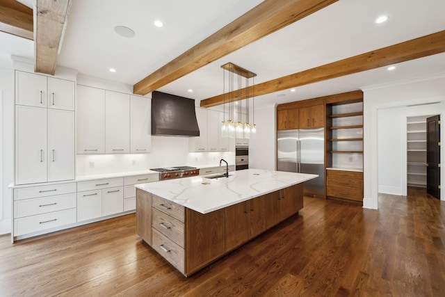 521 Mansion Dr, Brentwood, TN 37027 - kitchen featuring open shelves, wall chimney exhaust hood, a sink, stainless steel appliances, and dark wood-type flooring
