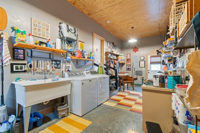 1720 Bratton Ln, Williamsport, TN 38487 - laundry room featuring laundry area, a workshop area, and washing machine and dryer