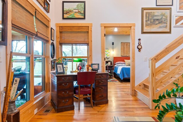 1720 Bratton Ln, Williamsport, TN 38487 - office featuring light wood-style flooring and a high ceiling