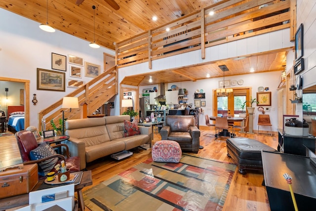 1720 Bratton Ln, Williamsport, TN 38487 - living room featuring wood ceiling, hardwood / wood-style floors, a towering ceiling, and stairs