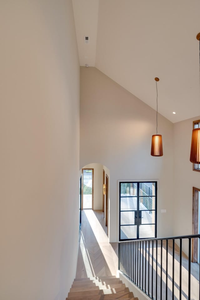 2108 12th Ave S, Nashville, TN 37204 - staircase featuring high vaulted ceiling and arched walkways