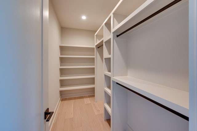 2108 12th Ave S, Nashville, TN 37204 - walk in closet featuring light wood-type flooring
