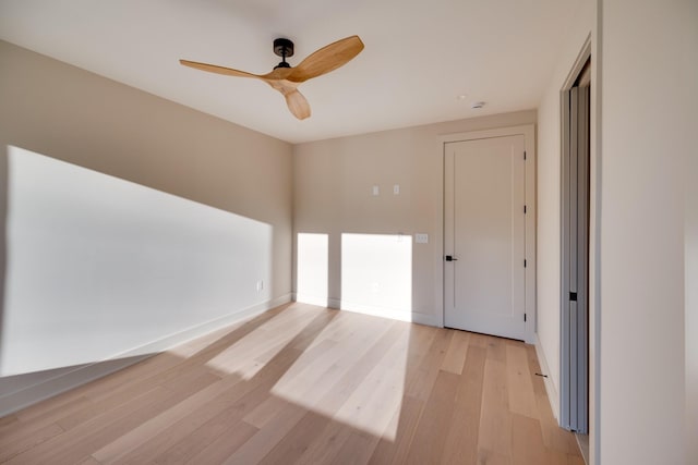 2108 12th Ave S, Nashville, TN 37204 - empty room with light wood-style flooring, baseboards, and ceiling fan