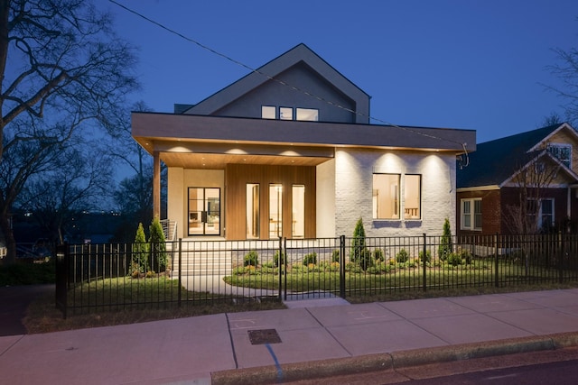 2108 12th Ave S, Nashville, TN 37204 - modern home featuring covered porch and a fenced front yard