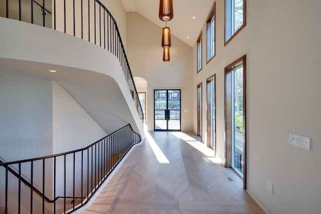 2108 12th Ave S, Nashville, TN 37204 - hall with recessed lighting, a towering ceiling, and stairs