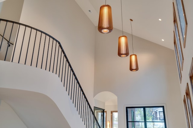 2108 12th Ave S, Nashville, TN 37204 - staircase featuring recessed lighting, arched walkways, and a towering ceiling