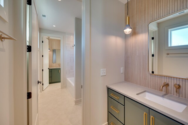 2108 12th Ave S, Nashville, TN 37204 - full bath with tile patterned floors, vanity, and recessed lighting