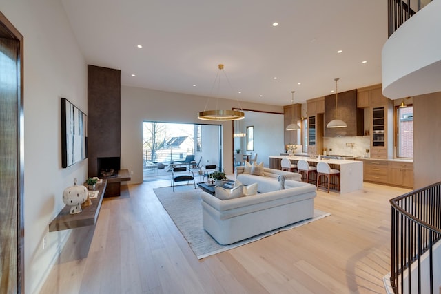 2108 12th Ave S, Nashville, TN 37204 - living room with recessed lighting, light wood finished floors, and a towering ceiling