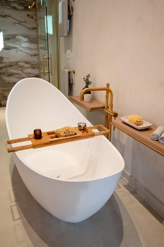 2108 12th Ave S, Nashville, TN 37204 - bathroom with a shower stall, a freestanding tub, and radiator heating unit