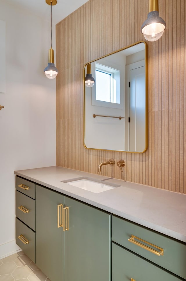 2108 12th Ave S, Nashville, TN 37204 - bathroom with vanity, wooden walls, and tile patterned flooring