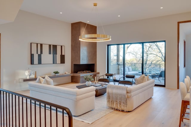 2108 12th Ave S, Nashville, TN 37204 - living room featuring wood finished floors and recessed lighting