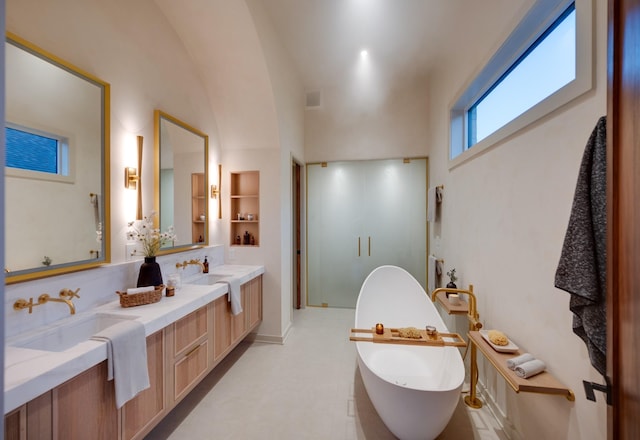 2108 12th Ave S, Nashville, TN 37204 - full bath featuring double vanity, visible vents, a sink, and a soaking tub