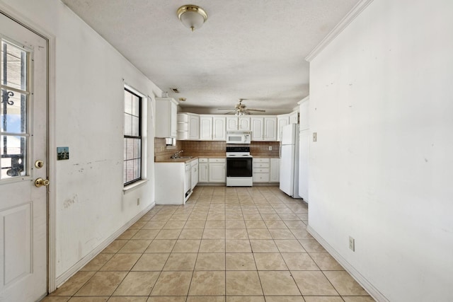 107 Heritage Trace Dr, Madison, TN 37115 - kitchen with a sink, decorative backsplash, white appliances, and a healthy amount of sunlight