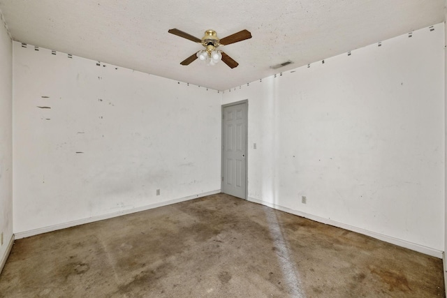 107 Heritage Trace Dr, Madison, TN 37115 - unfurnished room with ceiling fan, baseboards, visible vents, and concrete flooring