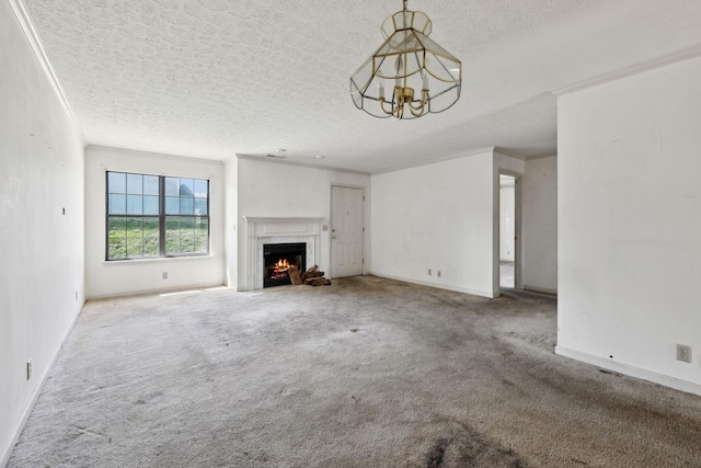 107 Heritage Trace Dr, Madison, TN 37115 - unfurnished living room featuring a chandelier, carpet, and a textured ceiling