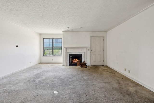 107 Heritage Trace Dr, Madison, TN 37115 - unfurnished living room featuring a premium fireplace, crown molding, and carpet floors