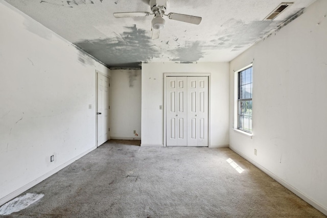 107 Heritage Trace Dr, Madison, TN 37115 - unfurnished bedroom with visible vents, baseboards, two closets, and carpet floors