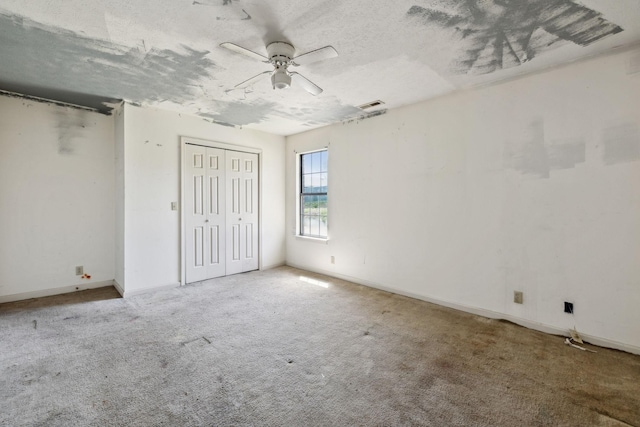 107 Heritage Trace Dr, Madison, TN 37115 - unfurnished bedroom with visible vents, baseboards, carpet, and a textured ceiling