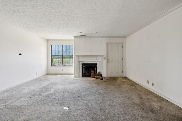 107 Heritage Trace Dr, Madison, TN 37115 - unfurnished living room with a premium fireplace, a textured ceiling, crown molding, and carpet floors